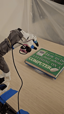 Robot opening a book
